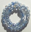 35 6mm Round Silver Foil Blue & Clear